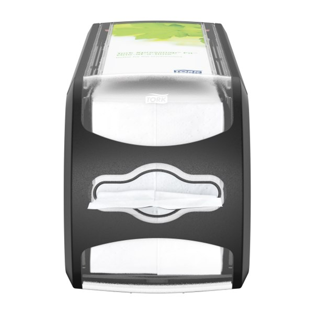 A black tabletop napkin dispenser with visible white napkins and a green label on top. Tork Xpressnap Fit® Counter Napkin Dispenser (12.8 in. x 4.8 in. x 5.6 in., 1/Case)